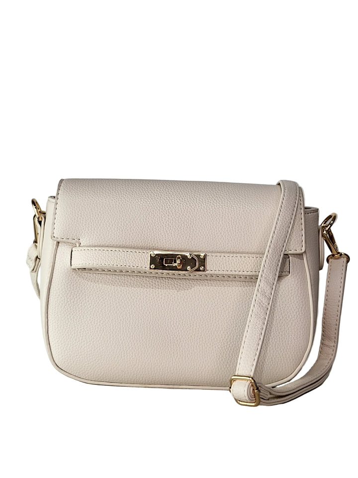 Beige handbag with gold accents on a light gray background