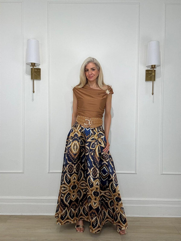 11250227 TOP - Zumel & Co