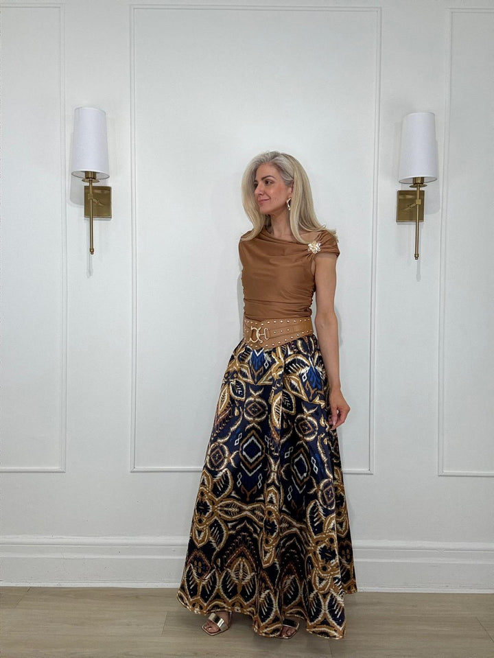 11250227 TOP - Zumel & Co